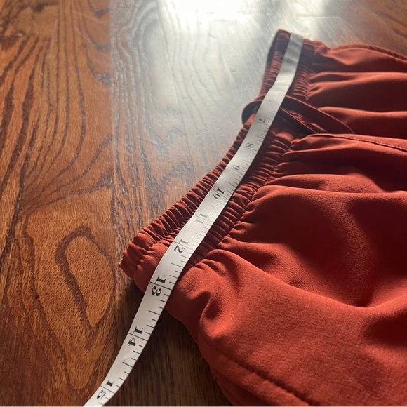 New Balance men’s orange wind breaker style pants size small - Picture 3 of 9